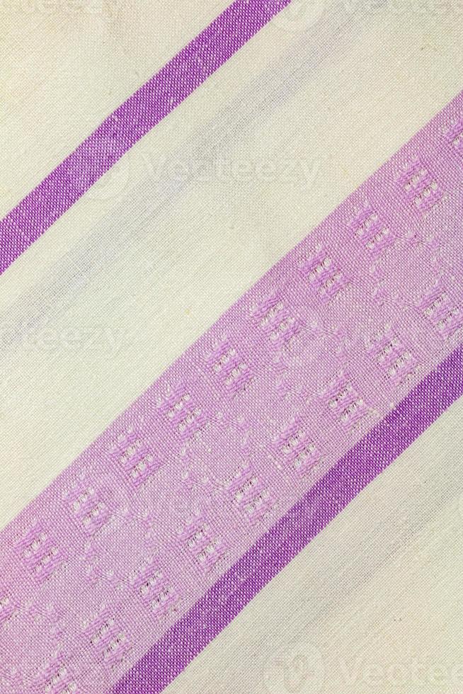 Closeup detail of multi color fabric texture samples. photo