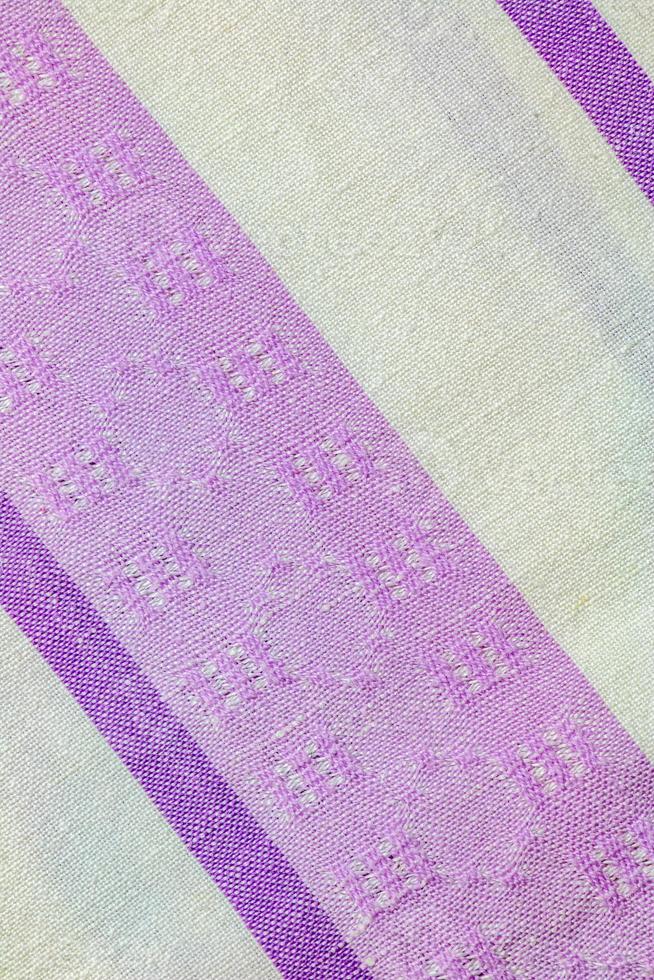 Closeup detail of multi color fabric texture samples. photo