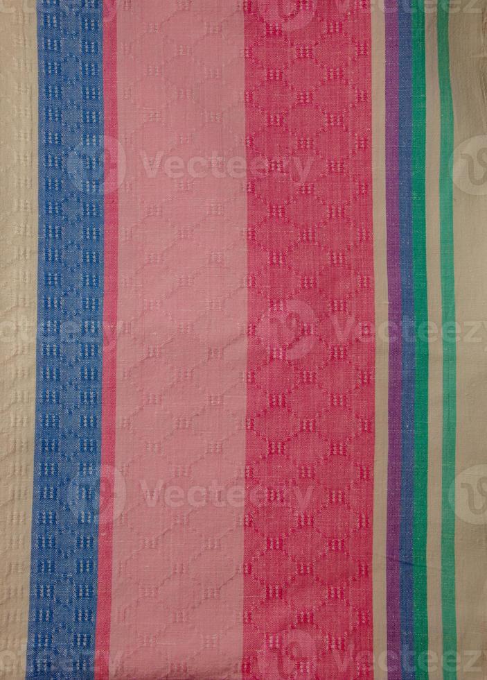 Closeup detail of multi color fabric texture samples. photo