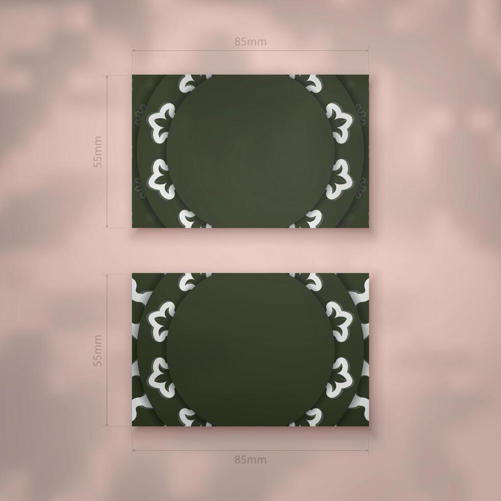 A dark green business card with a luxurious white pattern for your business. vector