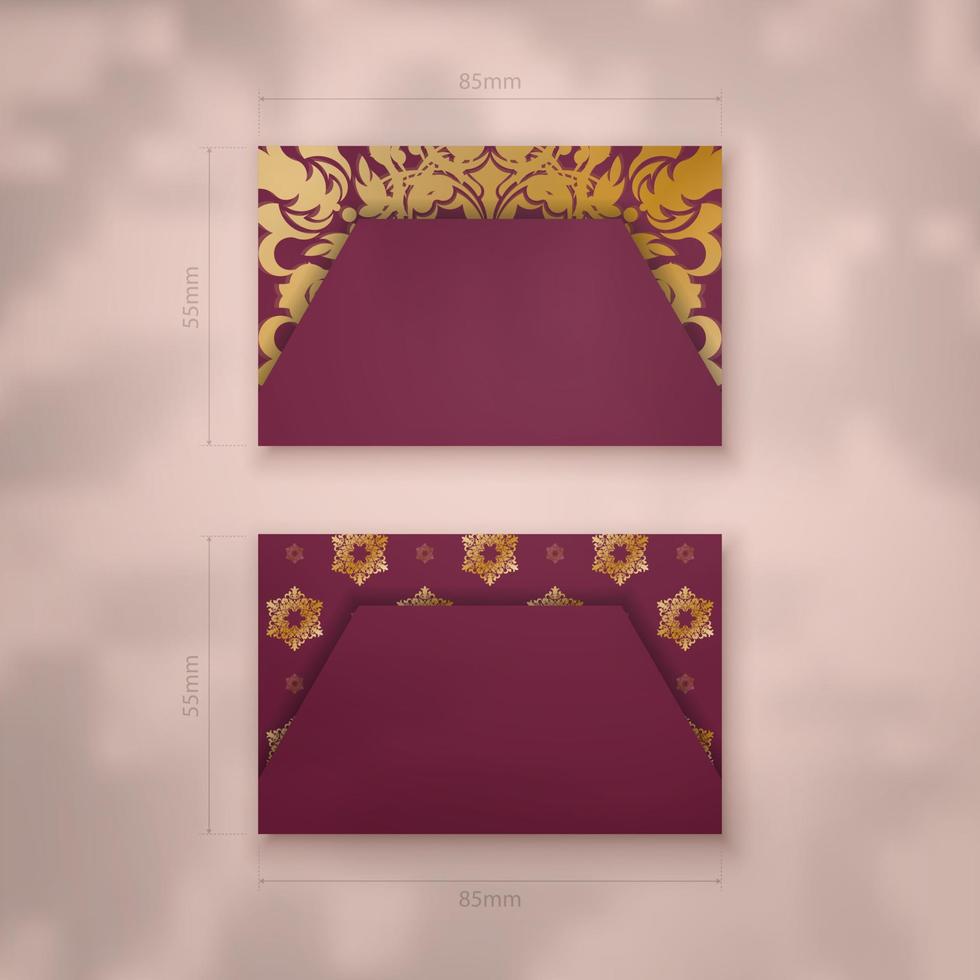 Burgundy business card with Greek gold ornaments for your business. vector