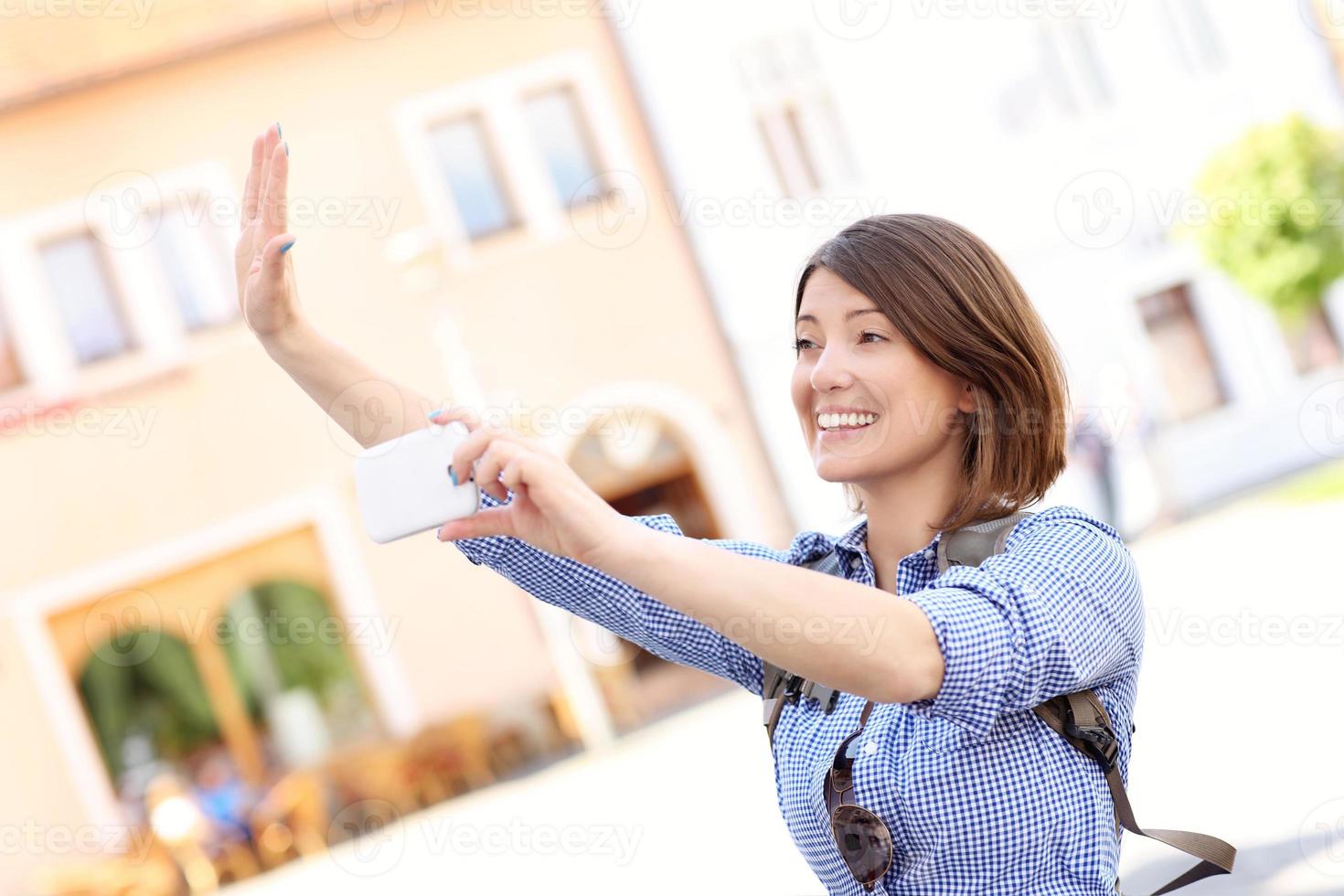 Woman taking picture photo