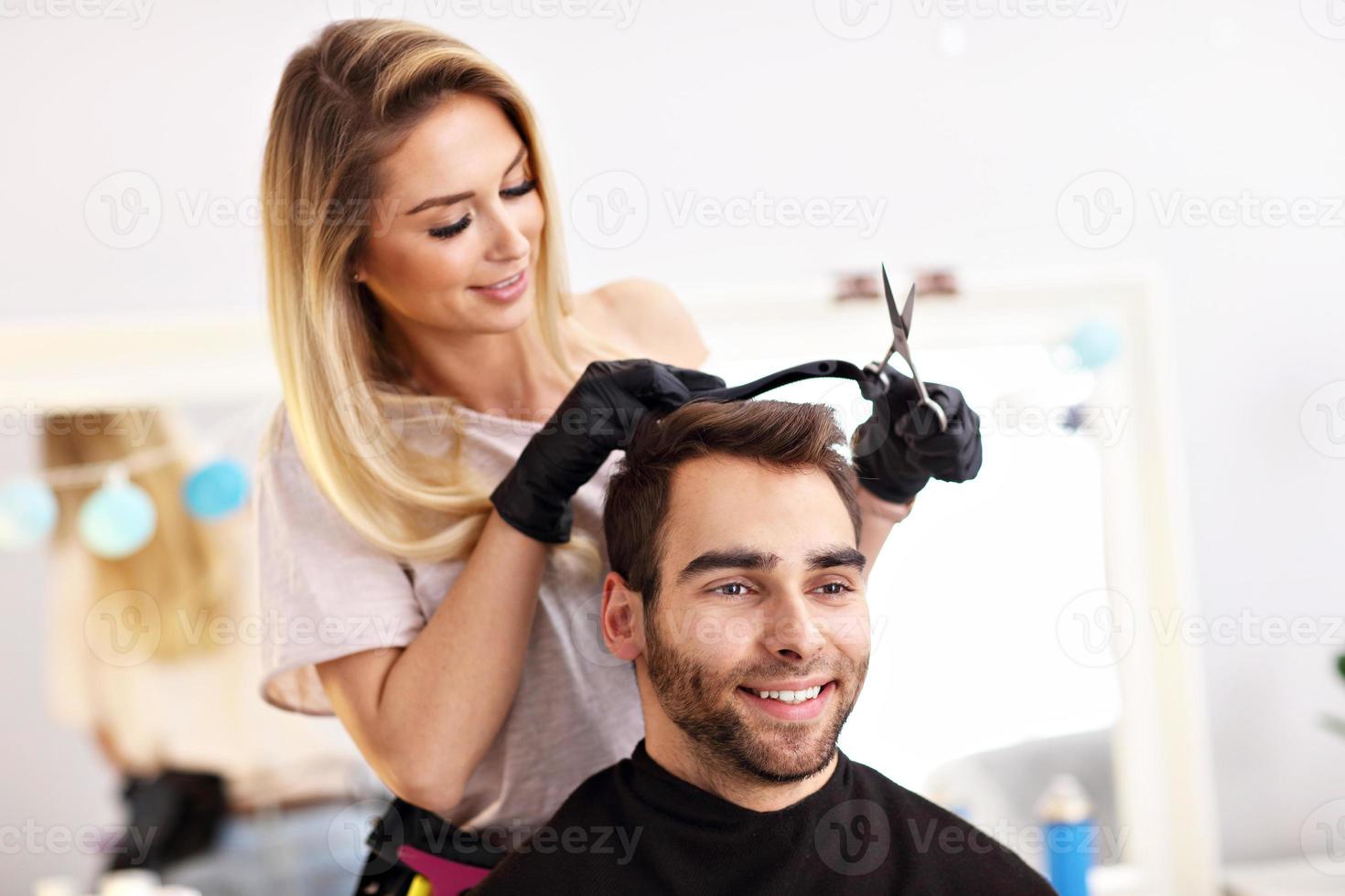 Adult man at the hair salon photo