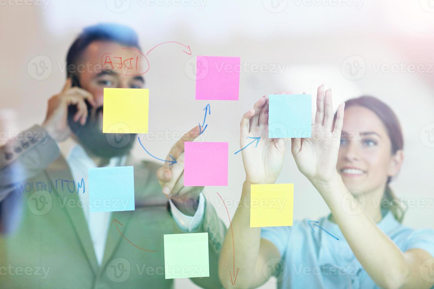 Businesspeople working together in office photo