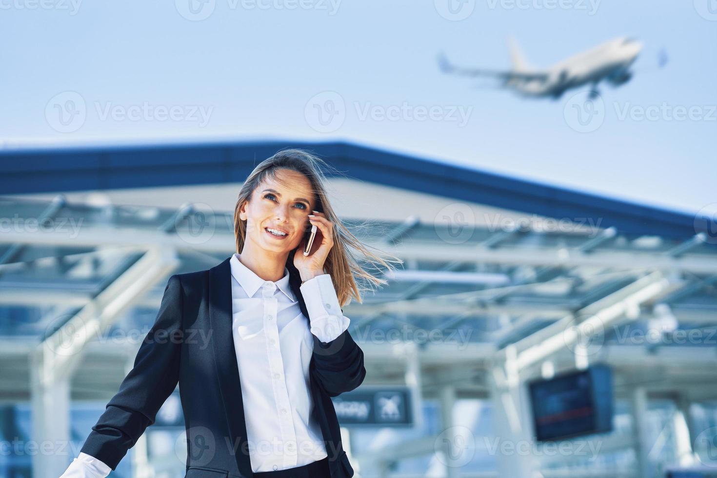 Adult female passenger at the airport photo