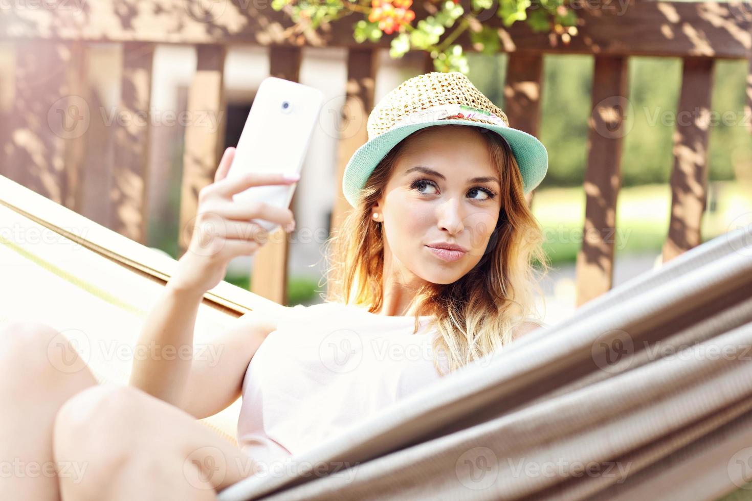 Relaxed woman resting outdoors photo