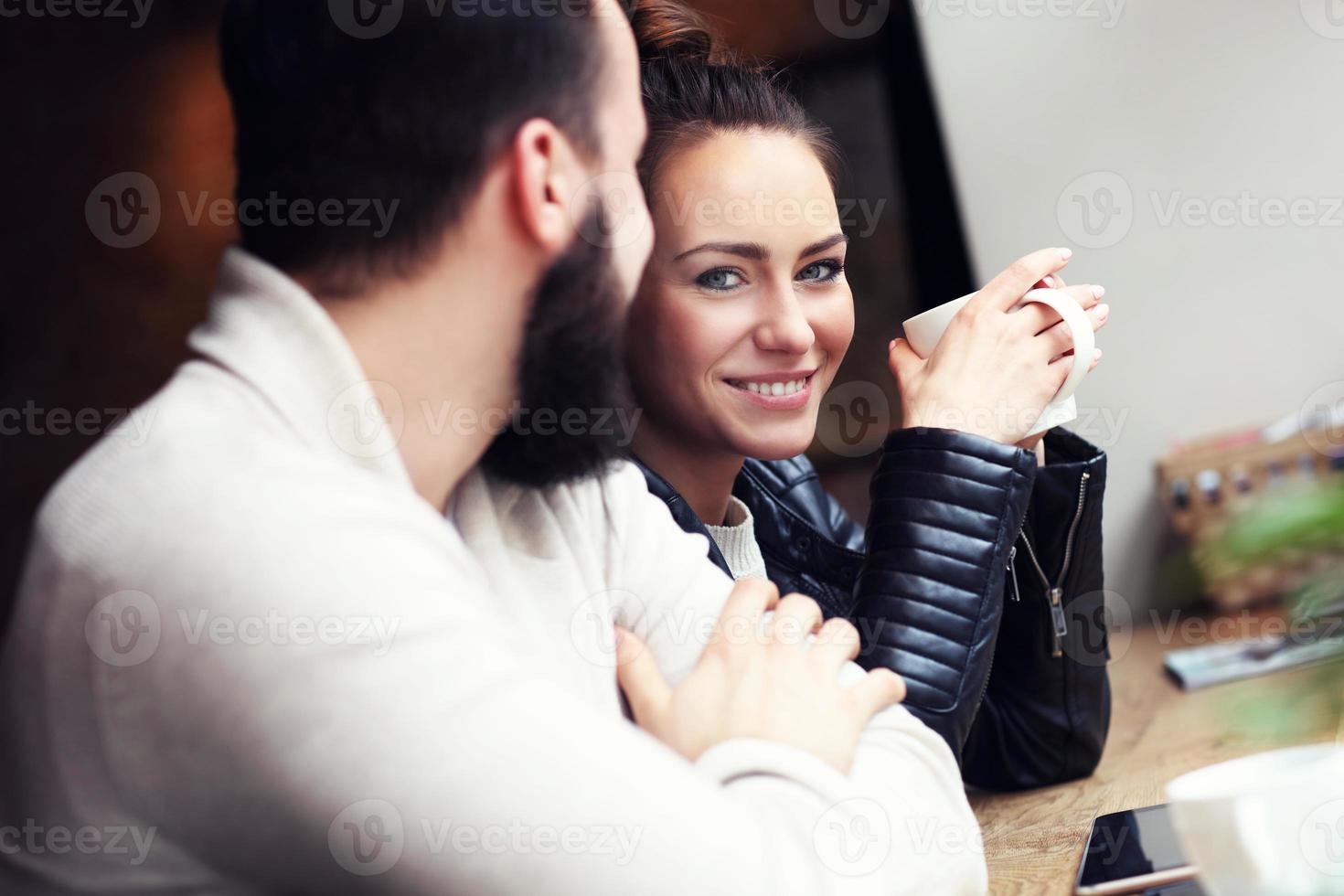 Happy couple in restaurant photo
