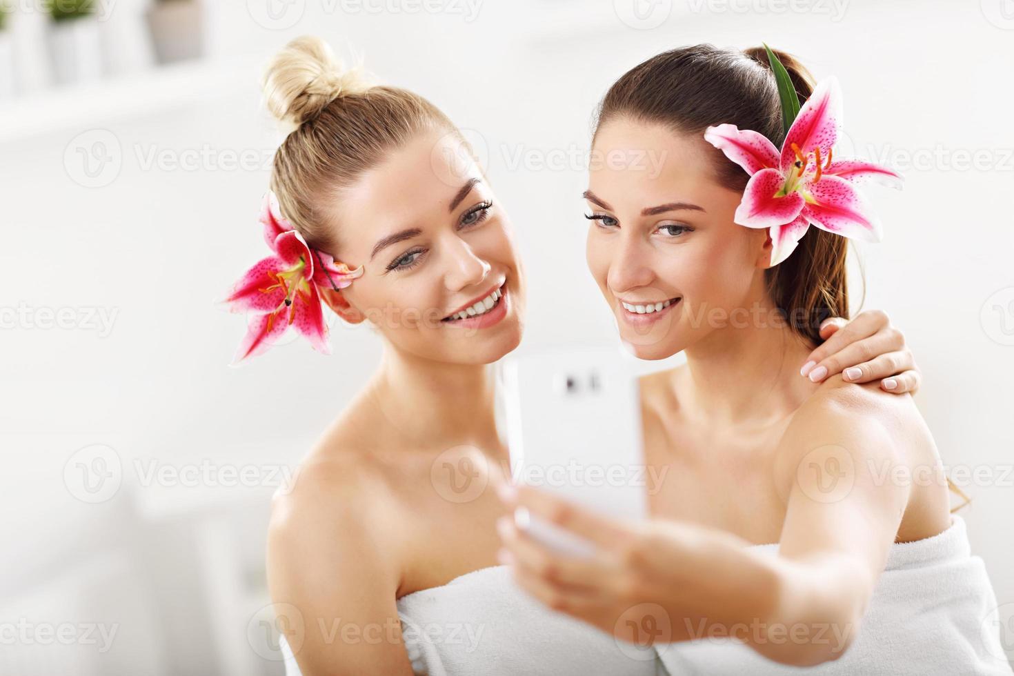 Two beautiful women in spa photo