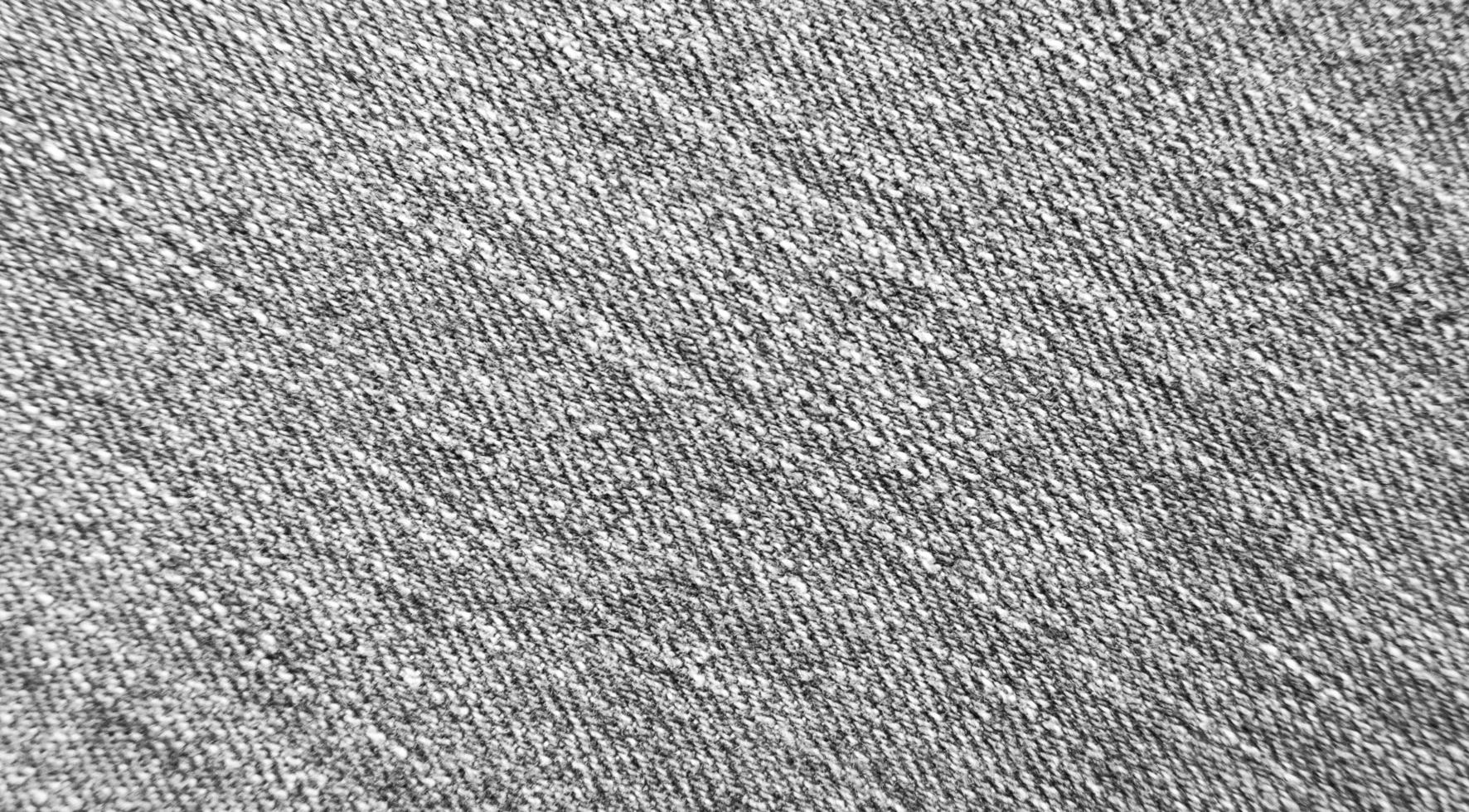 patrón de textura de mezclilla en blanco y negro de primer plano para fondos o superposición foto