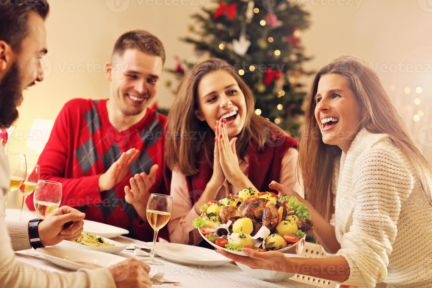 Group of friends celebrating Christmas photo