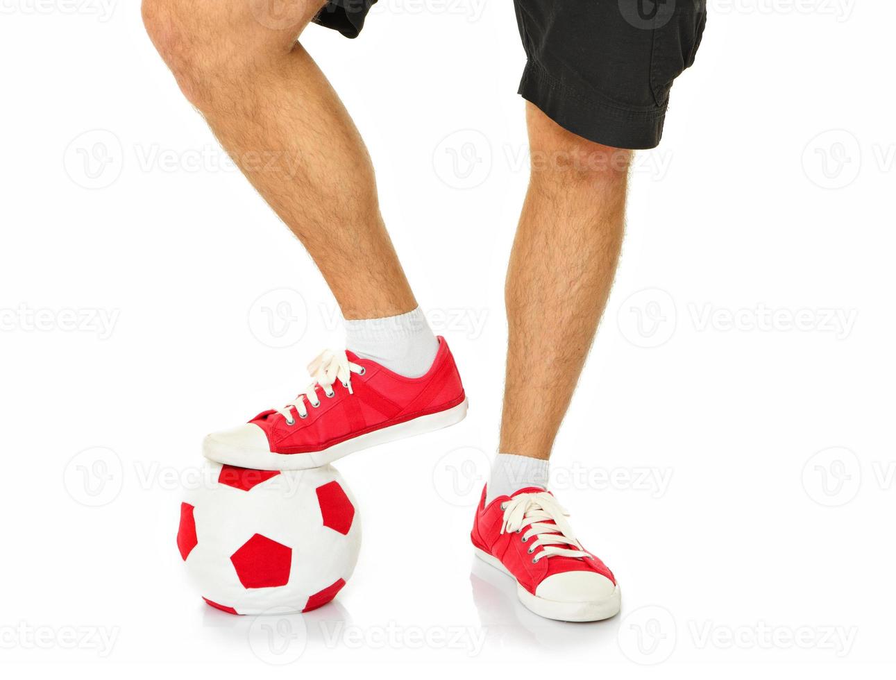 piernas de un futbolista foto