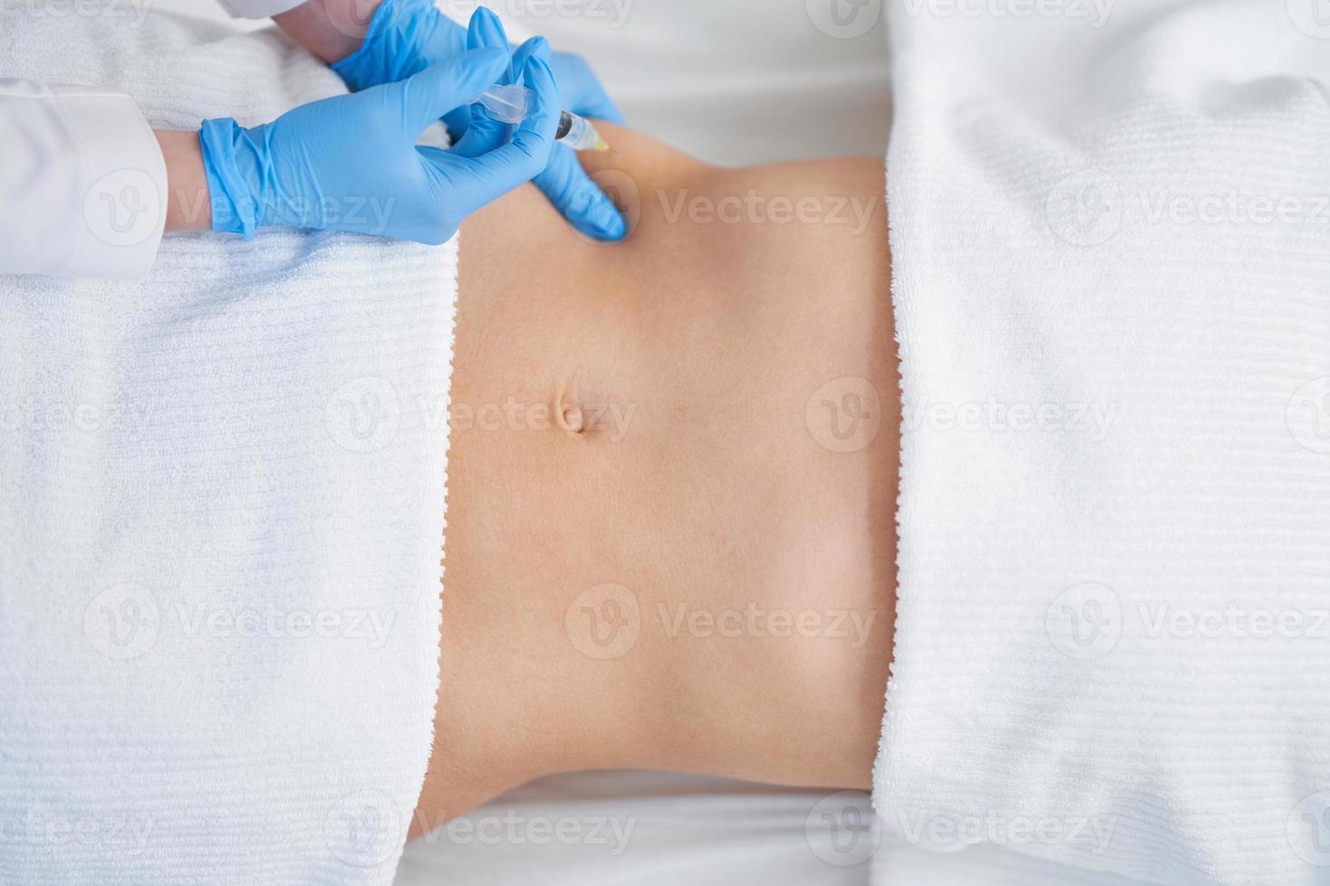 Picture of lipolysis treatment on different parts of woman body photo