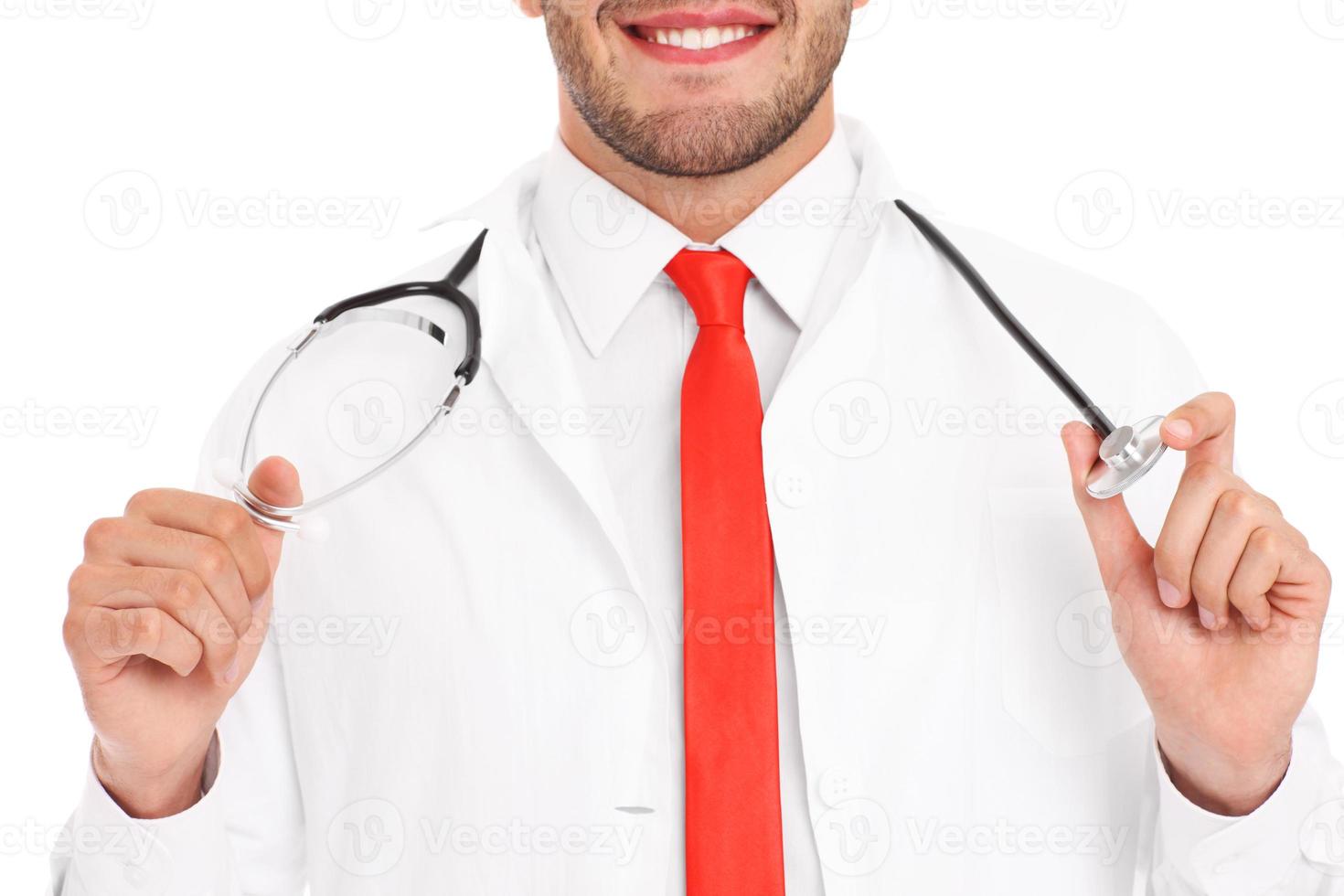 Midsection of doctor with stethoscope photo