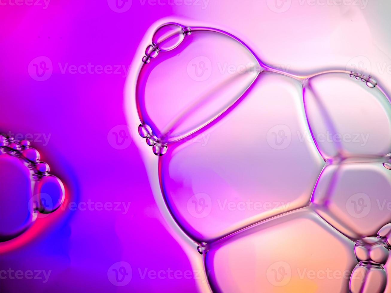macro colorful soap bubbles gradient abstract background blue pink photo