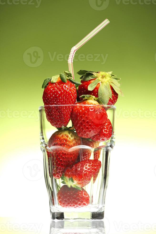 Strawberry drink with green backgroujnd photo