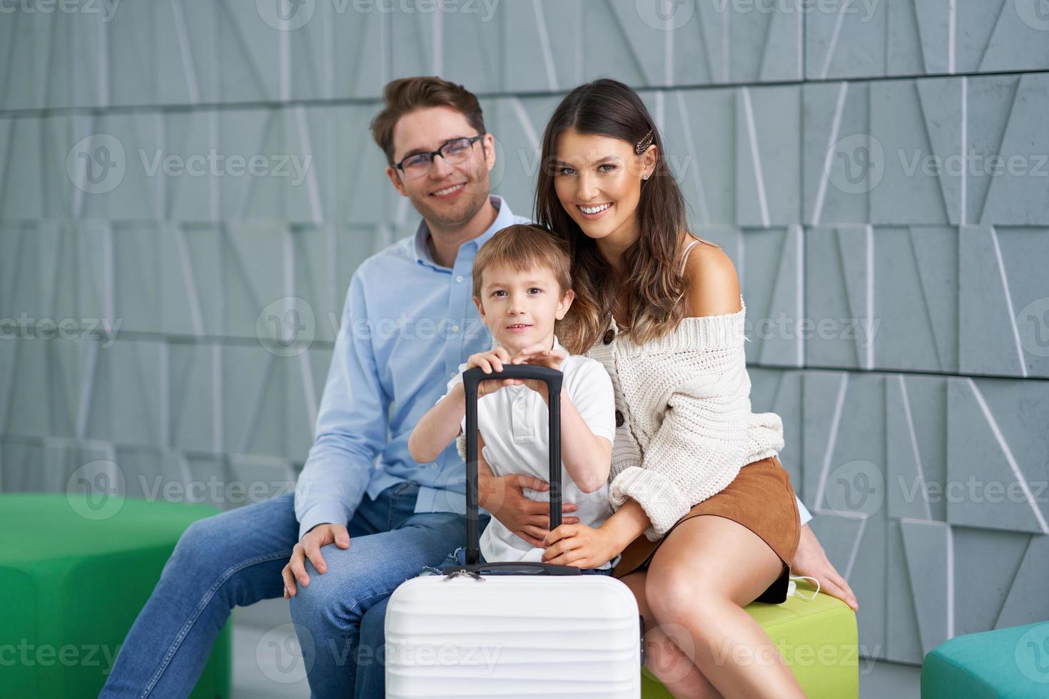 Picture of family waiting in hotel lobby photo