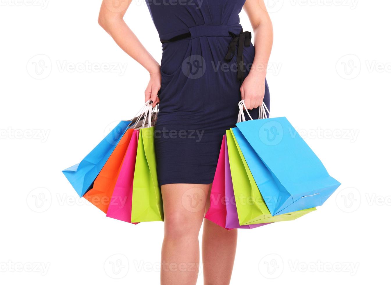 On sale concept. Woman holding shopping bags photo