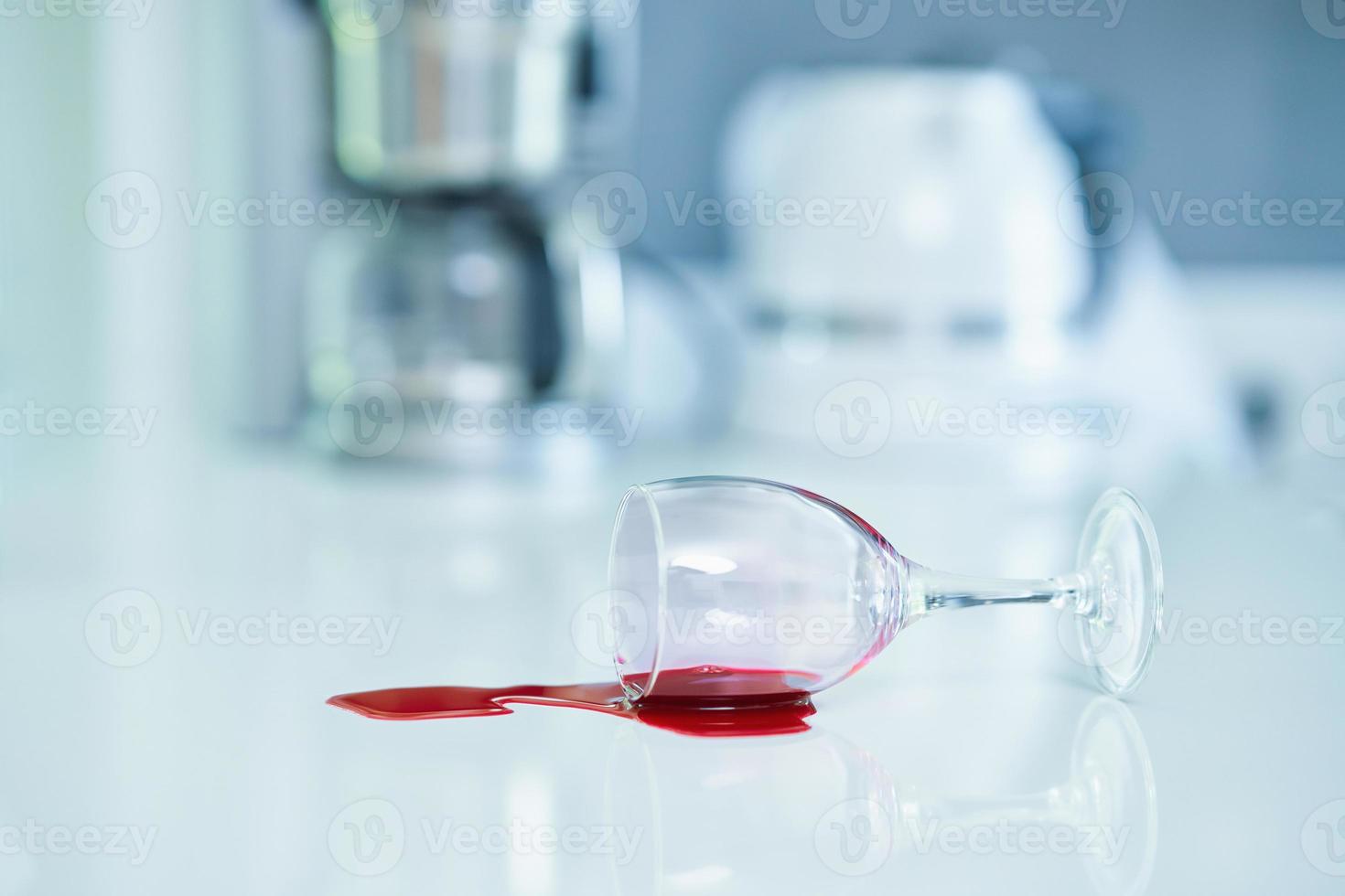 Close up of spilled wine in the kitchen photo