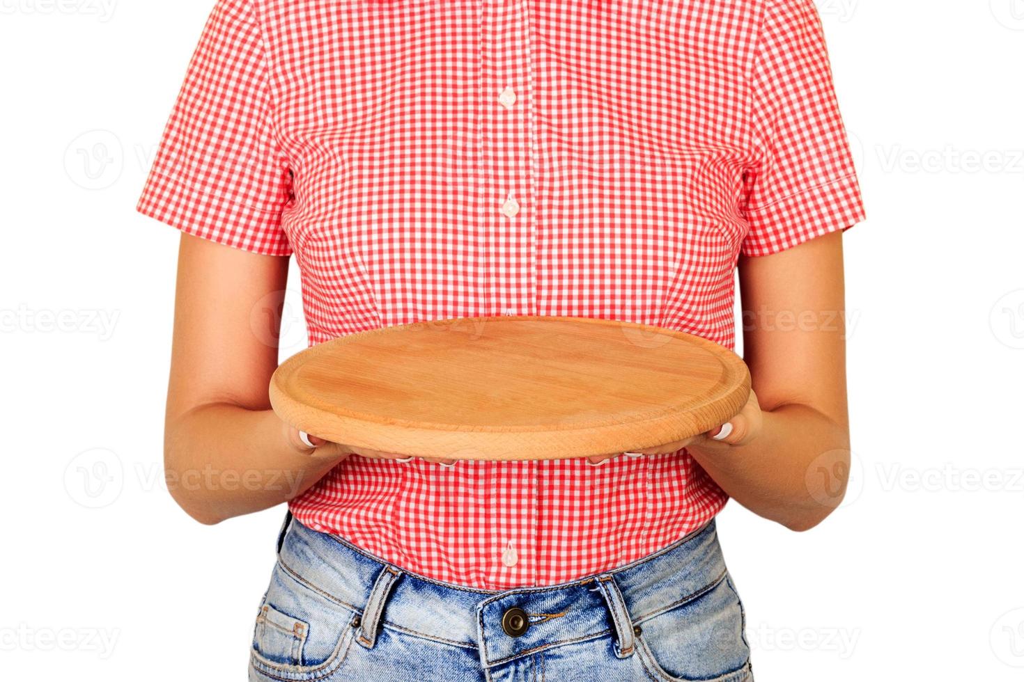 girl waiter holding a wooden empty board. perspective view isolated on white background. Template for your design photo