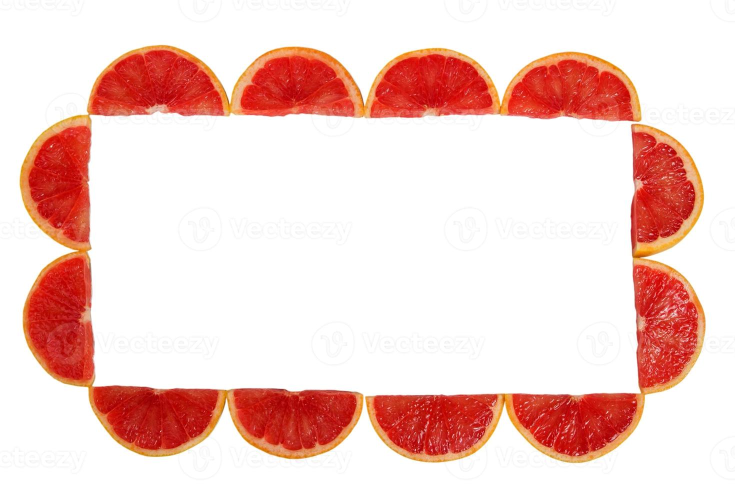 slice of grapefruit isolated on white background photo