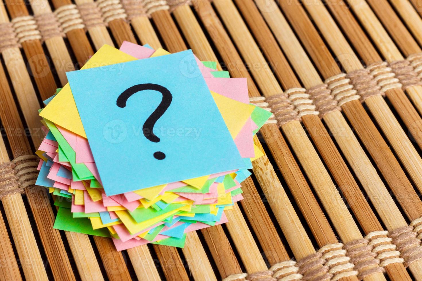 colorful question marks written reminders tickets. ask or business concept photo