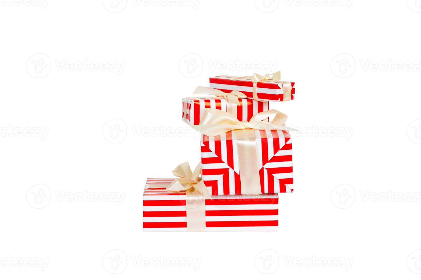 Set of christmas or other holiday handmade present in red paper with gold ribbon. Isolated on white background, top view. thanksgiving Gift box concept photo