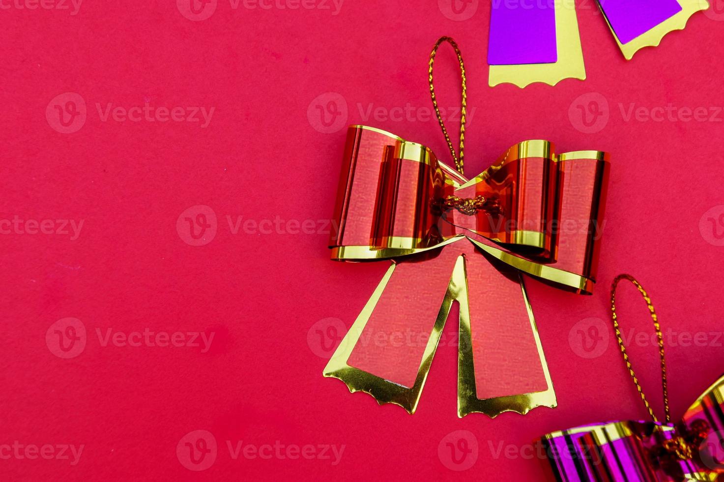 ribbon bow on red background , geeting card and copy space photo