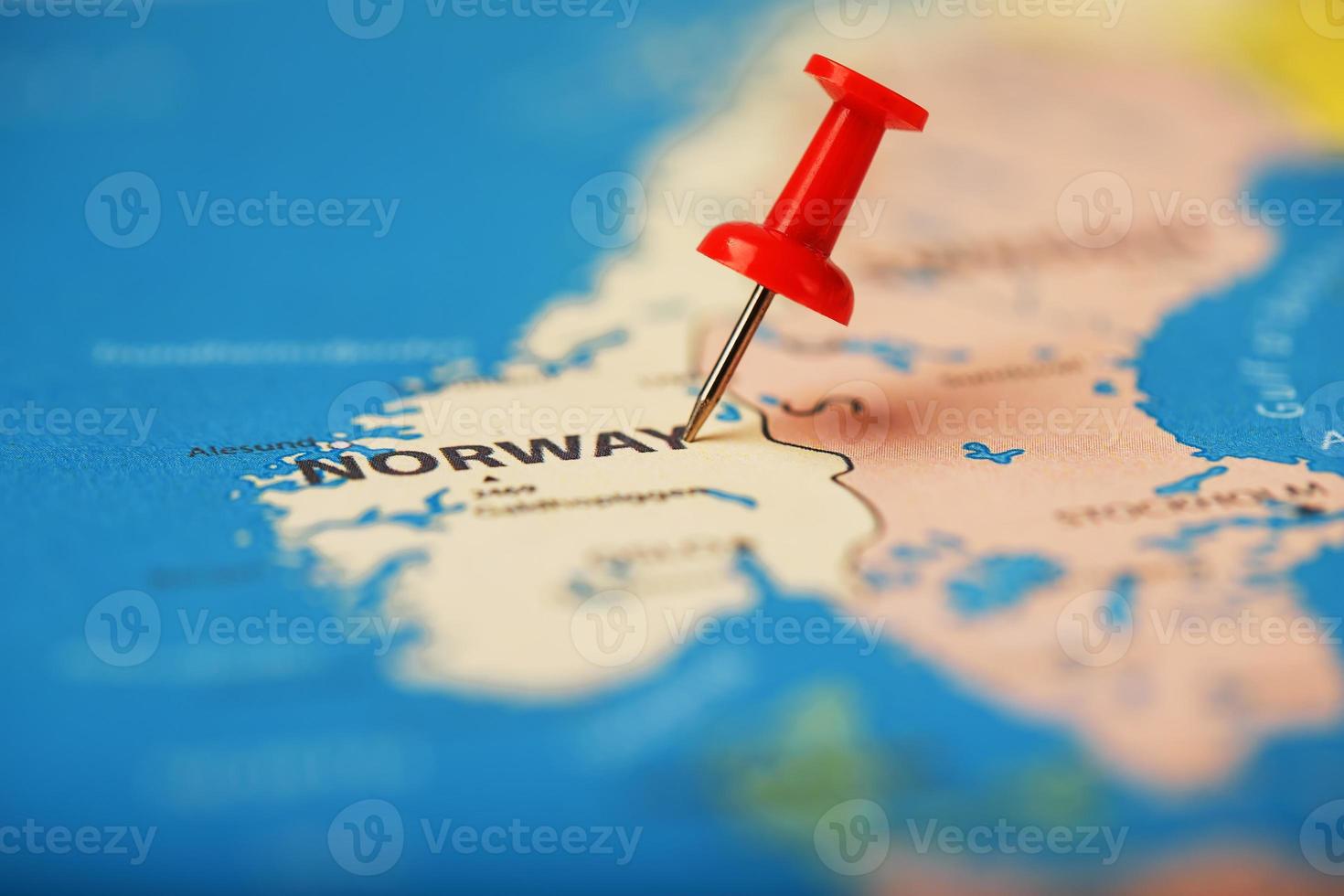 Multi-colored buttons indicate the location and coordinates of the destination on the map of Norway photo