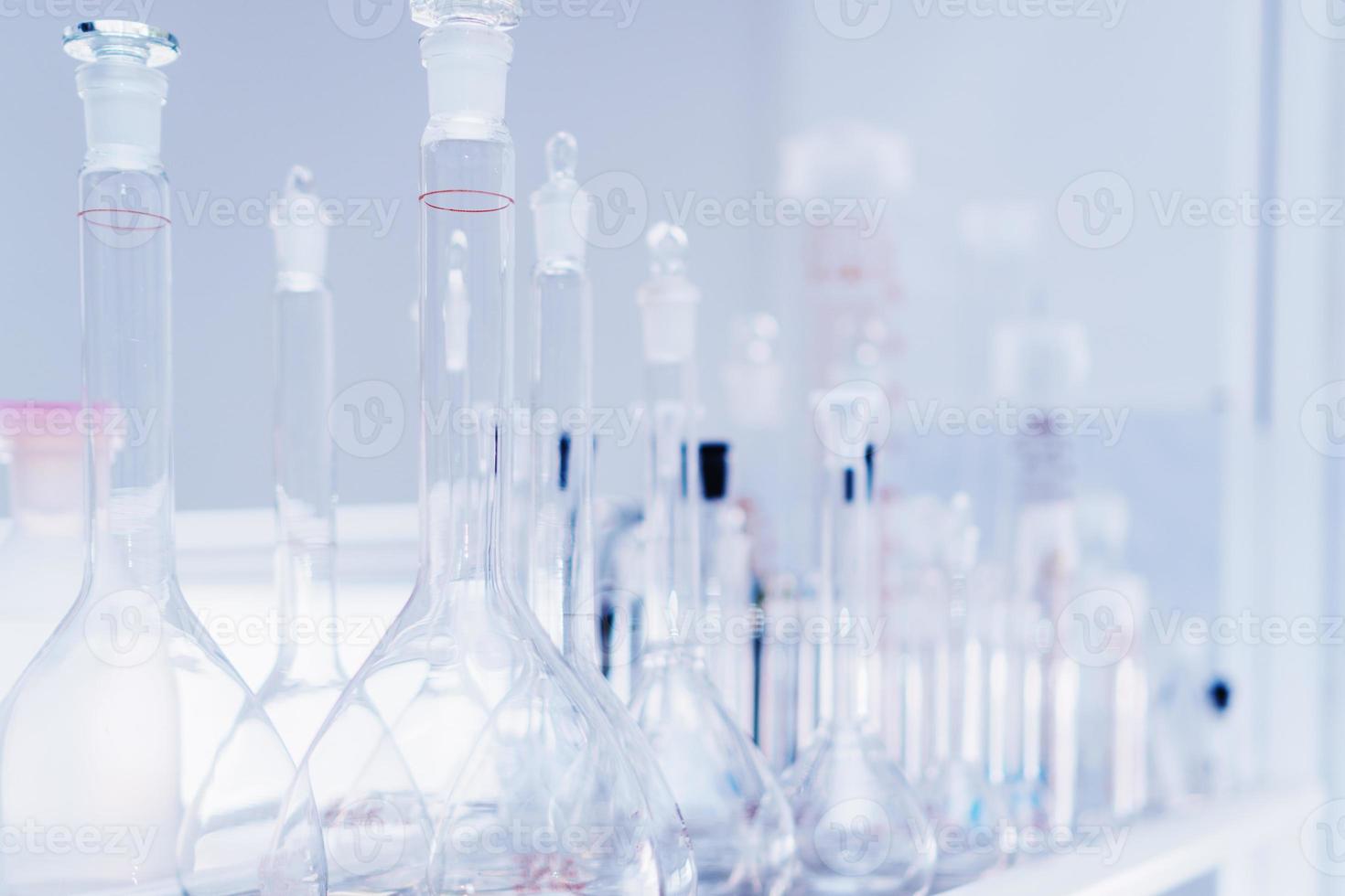 Laboratory tubes and flasks for analyzes and experiments. photo