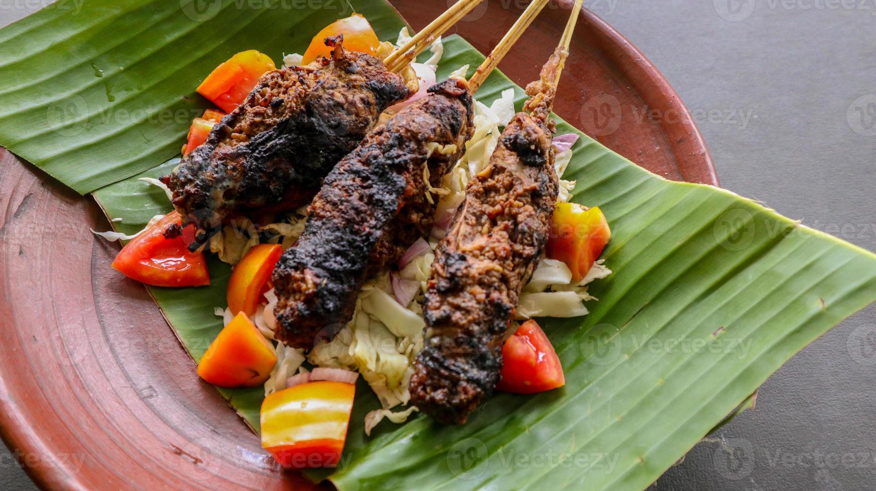 sate buntel or satay buntel is satay made from minced mutton wrapped in mutton fat and then