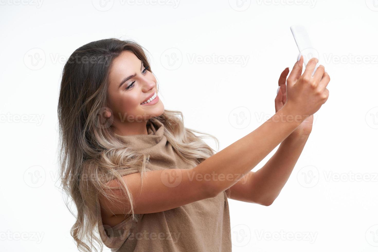 Beautiful adult woman portrait. Studio shot, isolated on white background photo