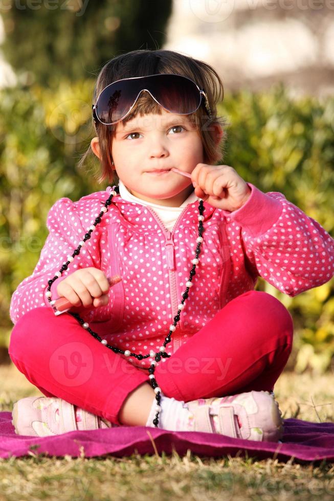 Baby girl in the park photo