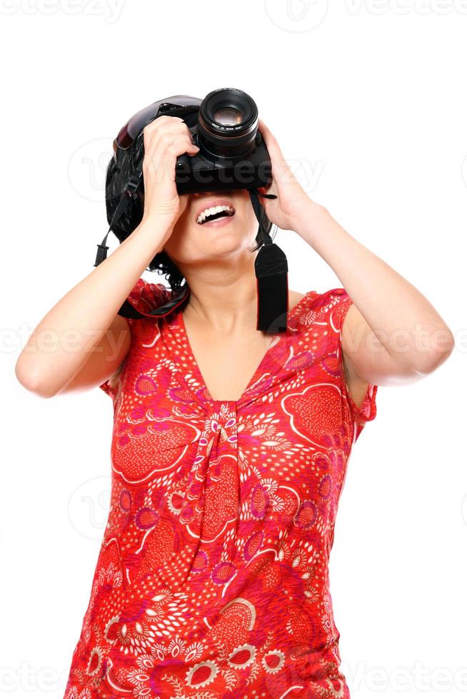 Young woman taking pictures photo