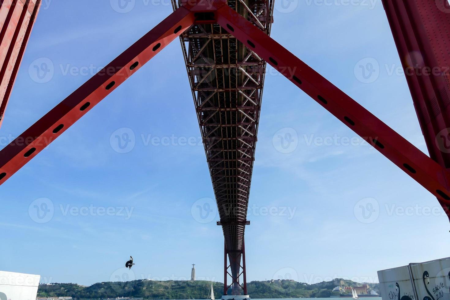 The Ponte 25 de Abril or 25th of April Bridge in Lisbon, Portugal photo