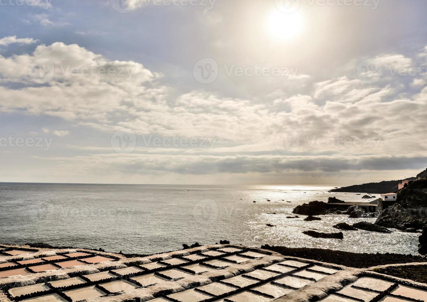 Sea salt production and drying pools at the Salinas de Fuencaliente, salt flats at the southernmost tip of La Palma, Canary Islands, Spain photo