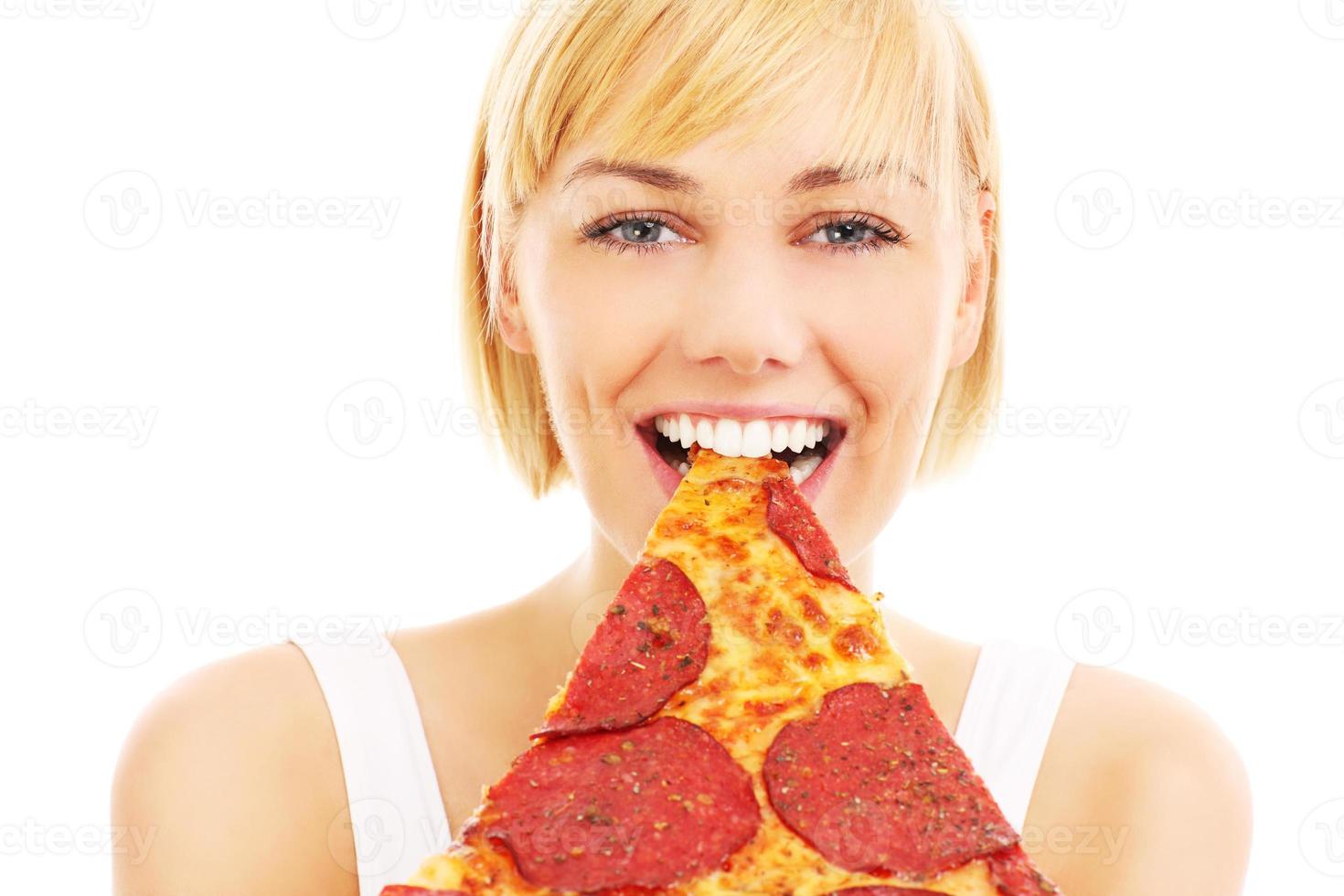 Woman and pepperoni pizza photo