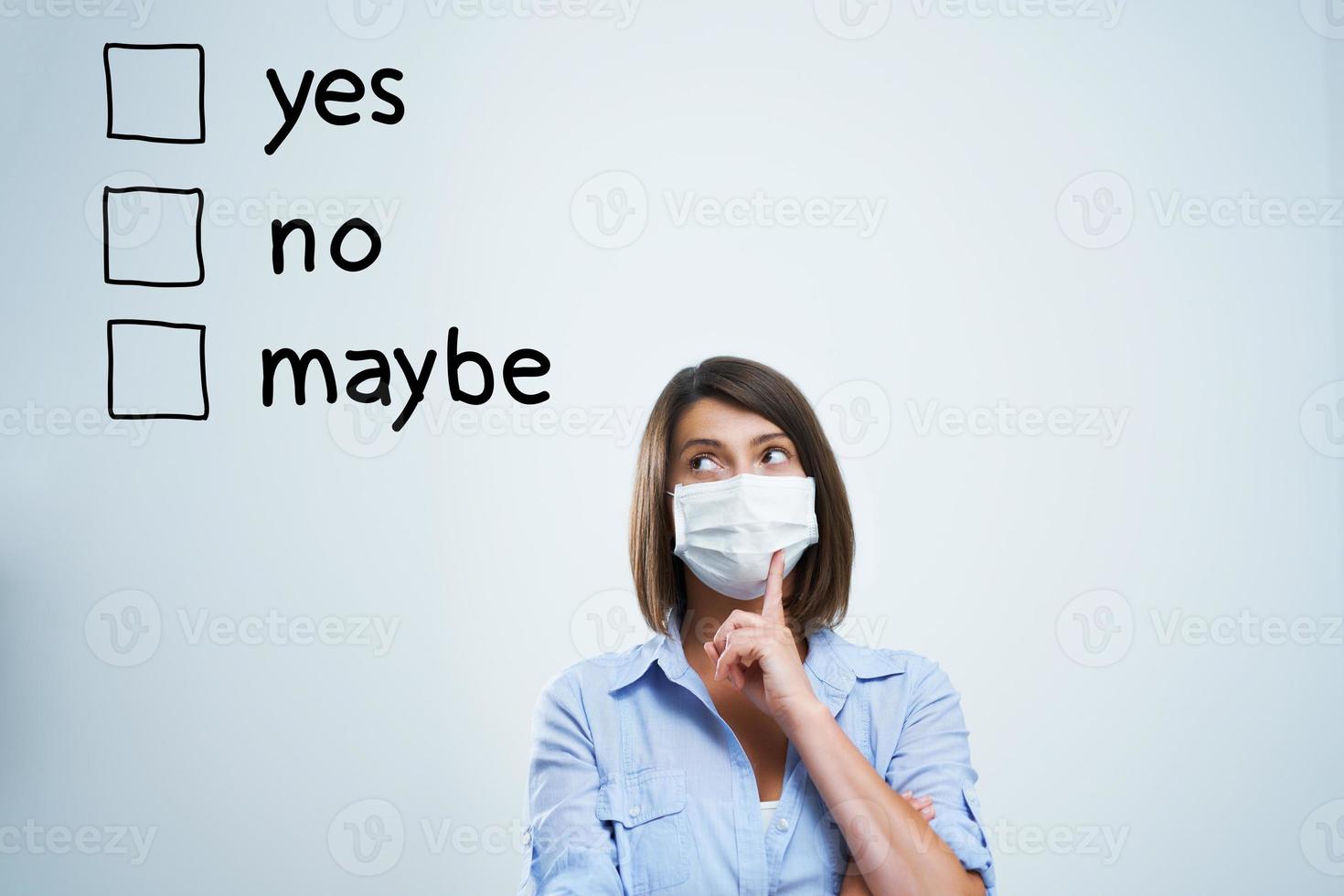 Attractive woman wearing protective mask isolated over white background photo