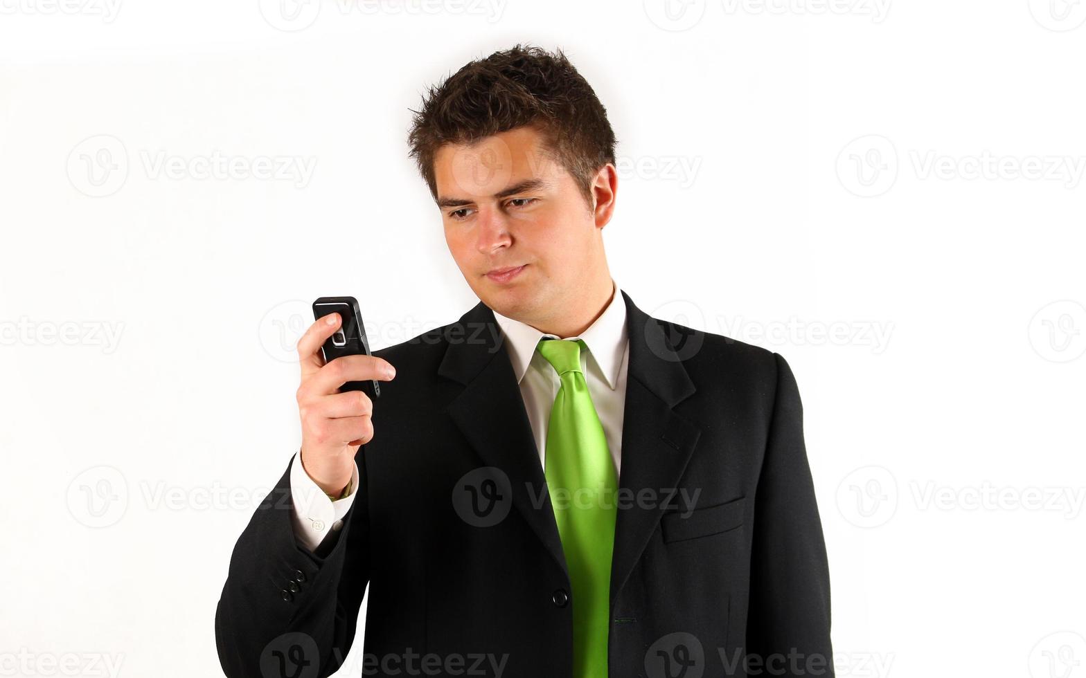 young businessman with phone photo