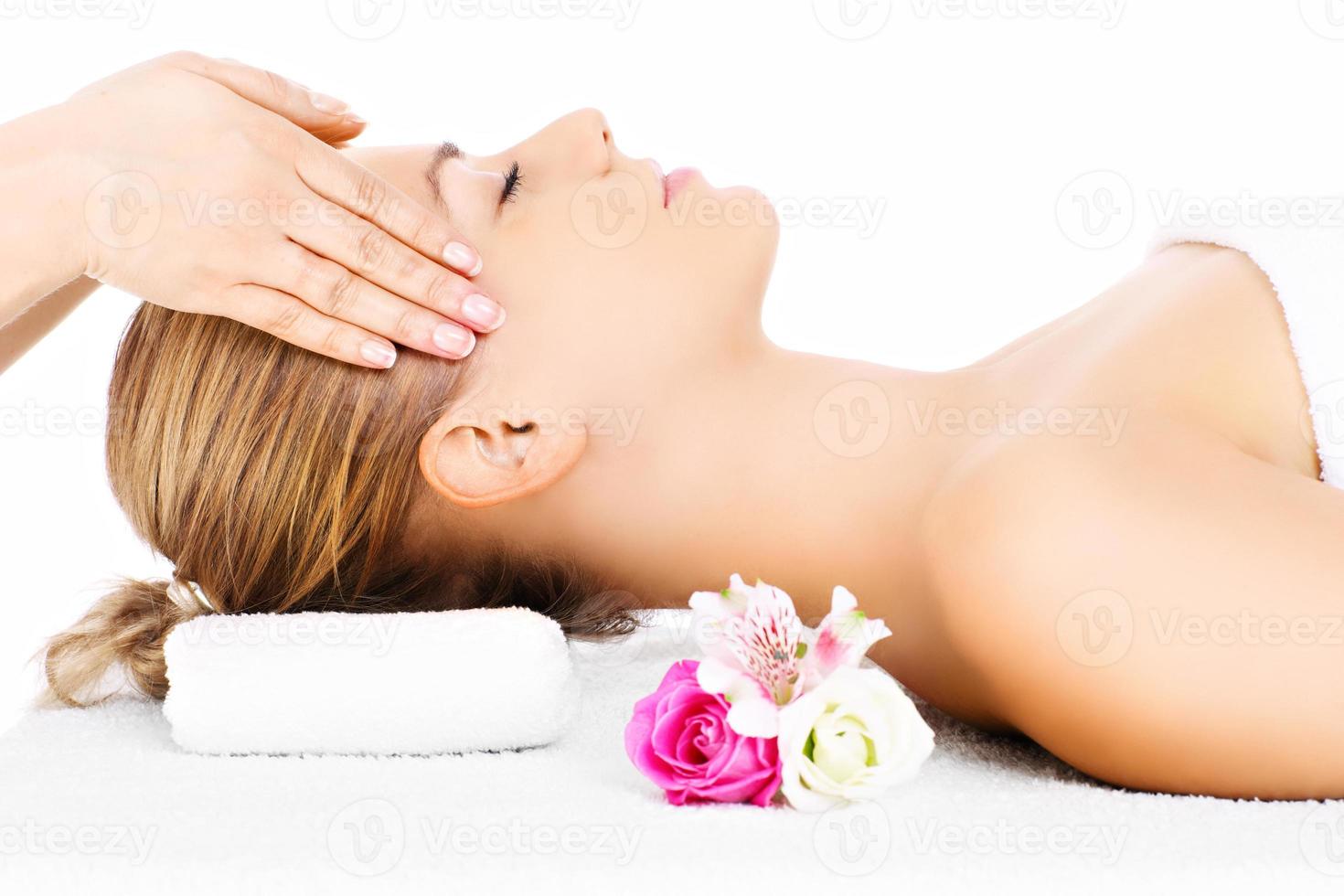 Woman having head massage photo