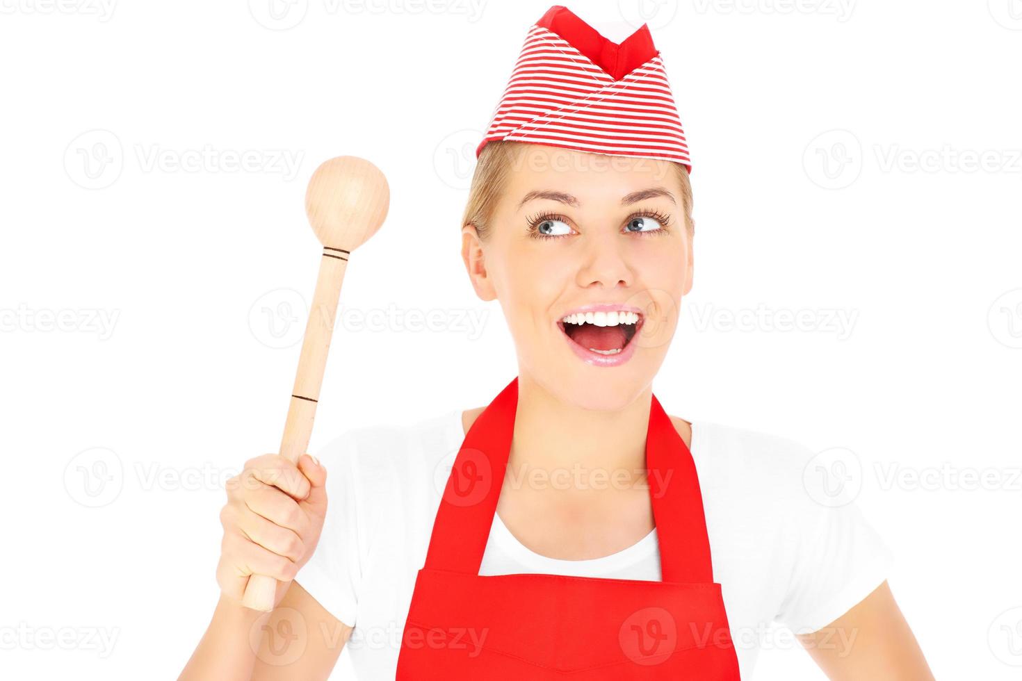 Woman with a wooden mortar photo