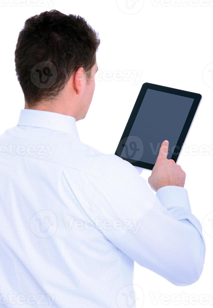 Businessman holding a tablet device photo