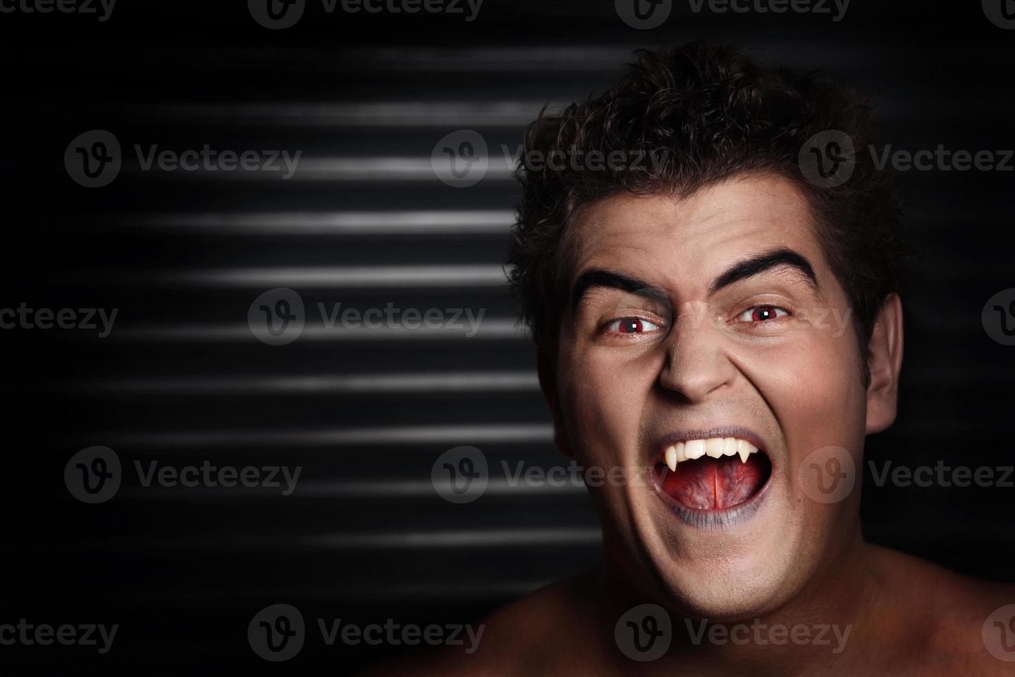 Male vampire screaming photo