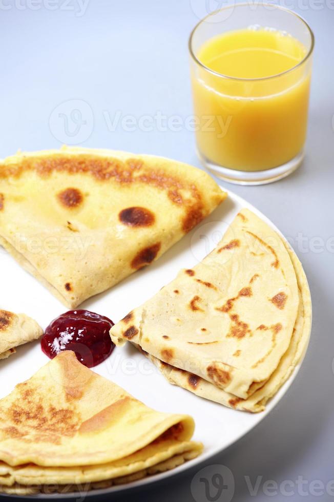 Pancakes with raspberry jam photo