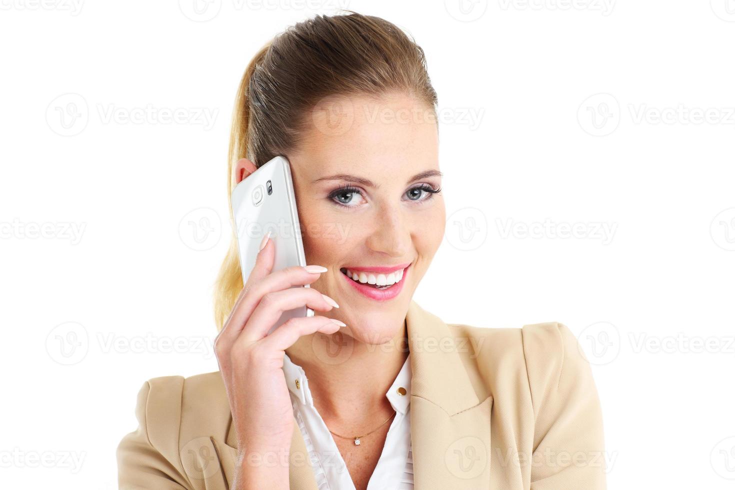 Businesswoman with smartphone photo