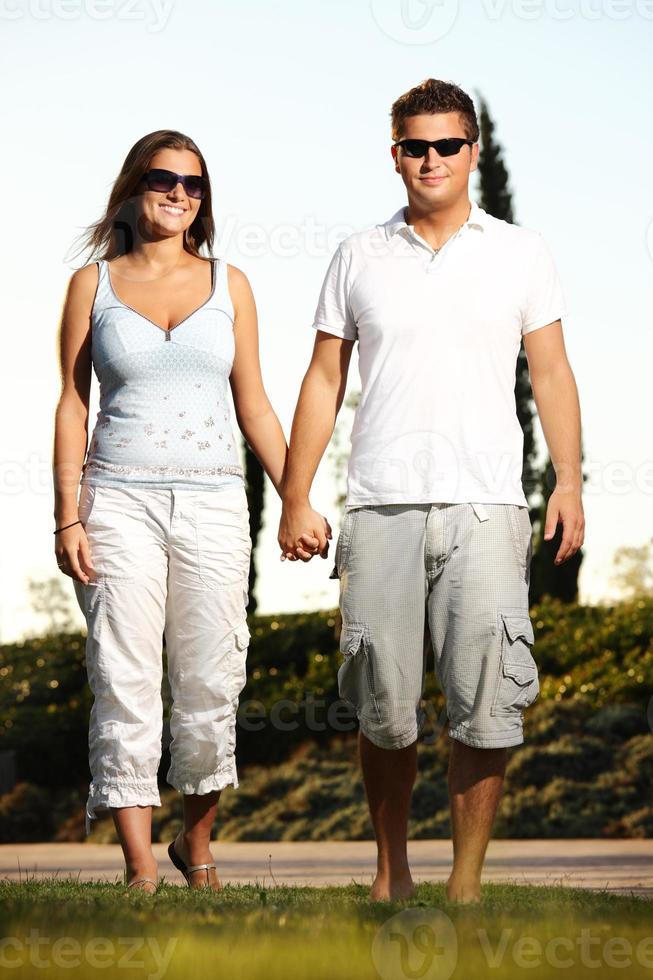 Young couple on a walk in the park photo