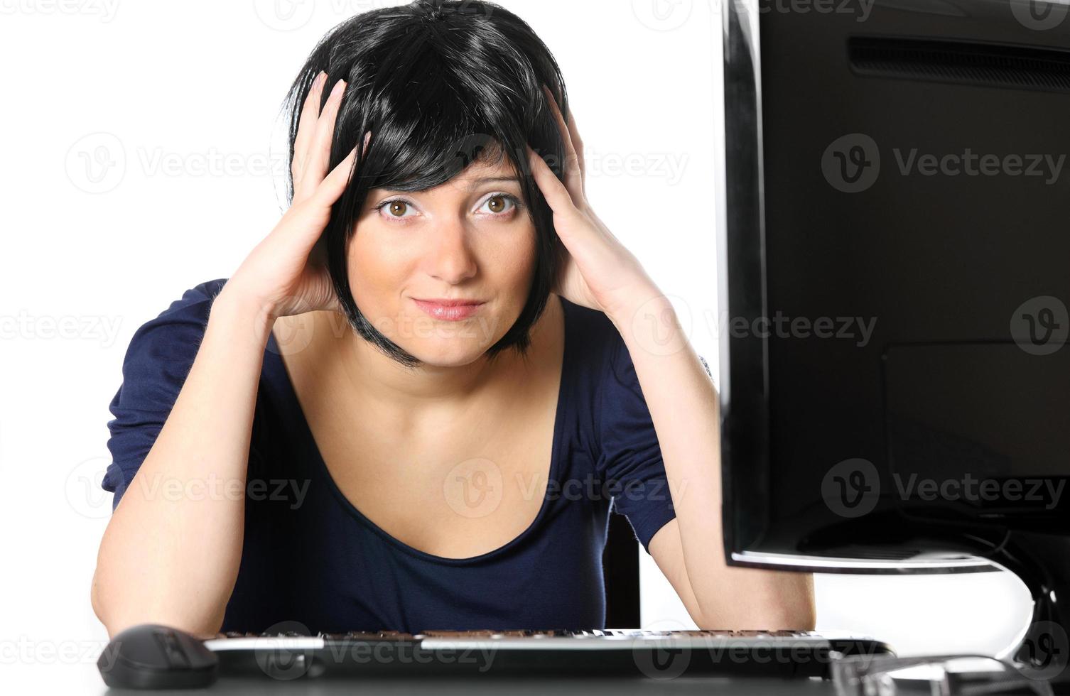 Frustrated woman at work photo