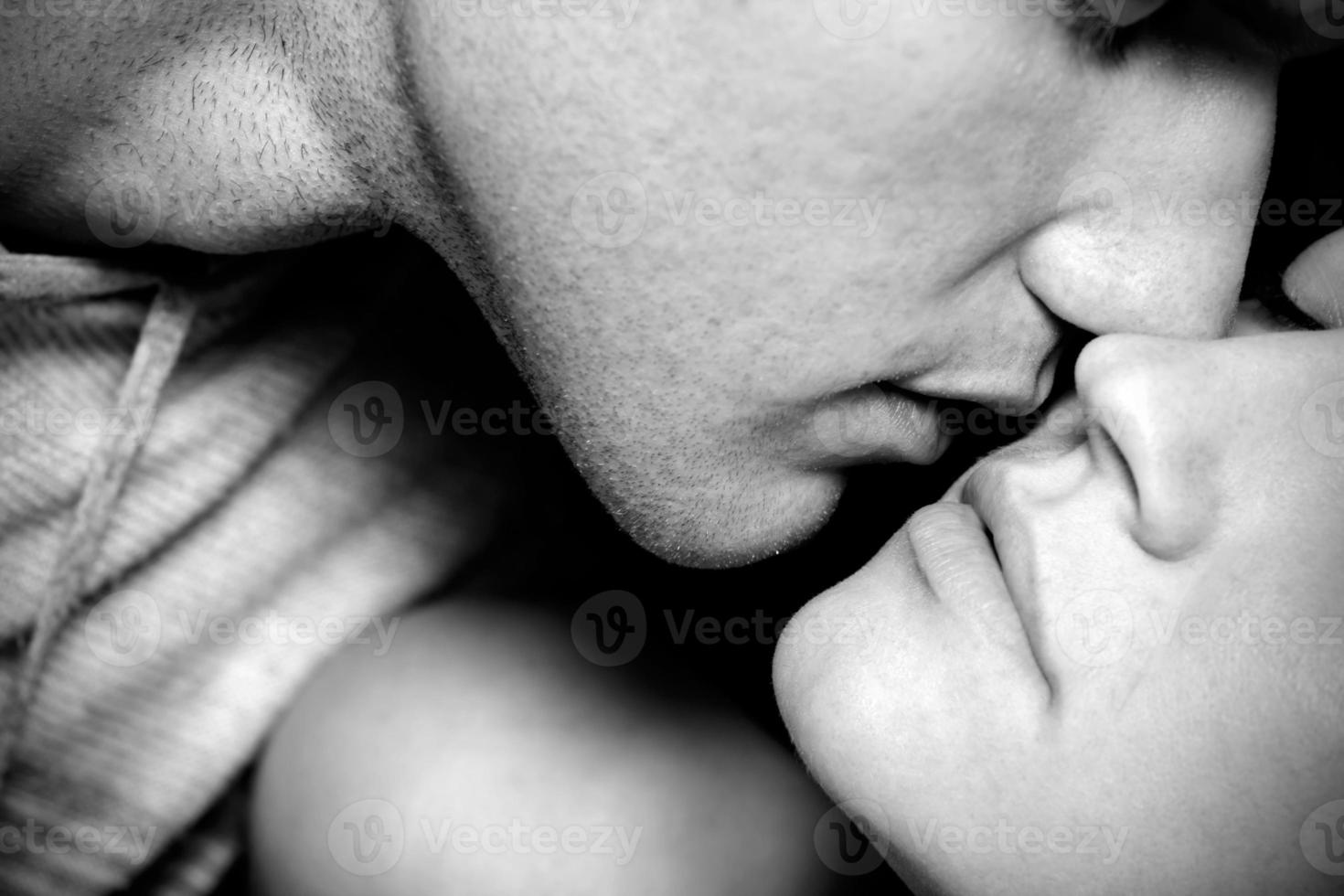 woman and man kissing photo