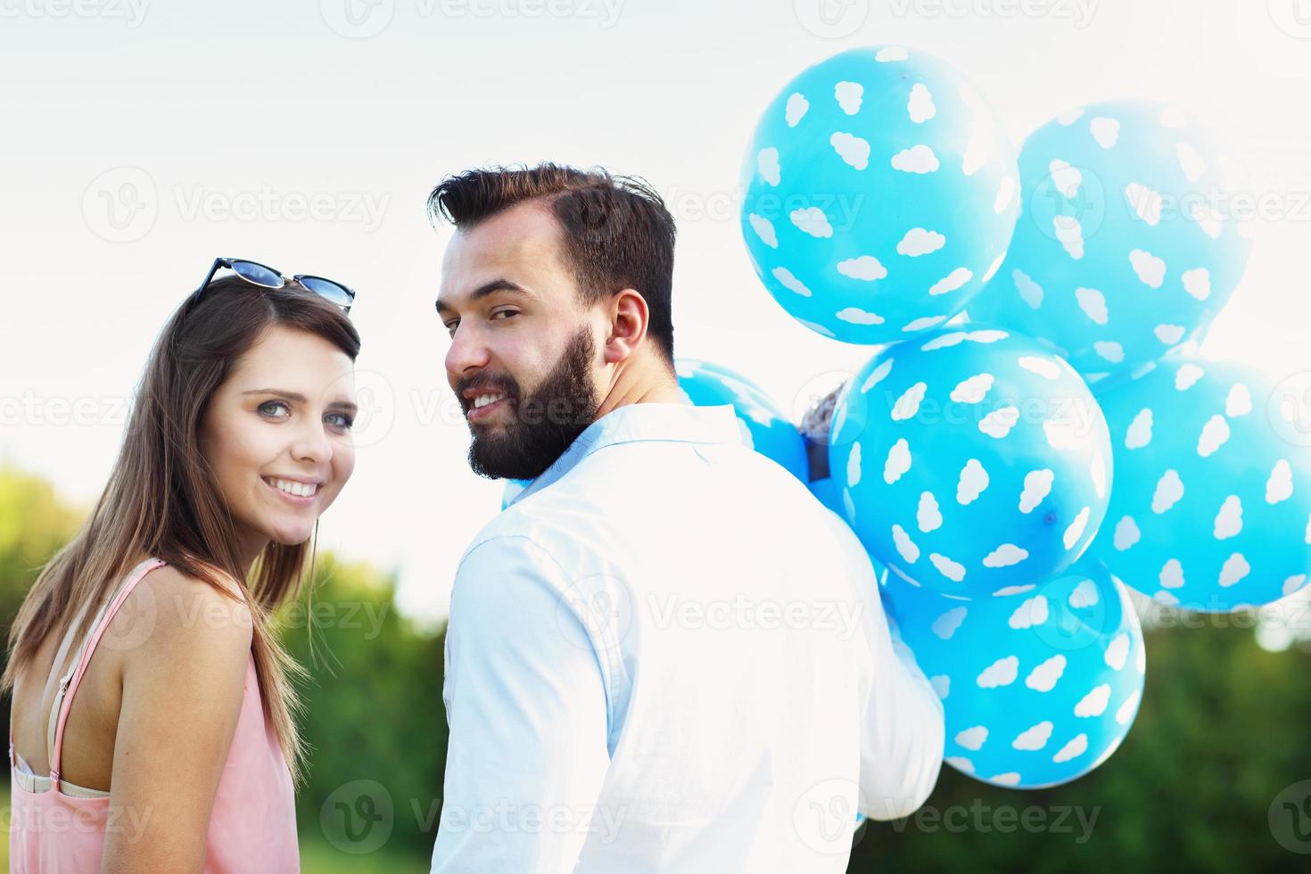 Romantic couple with baloons photo