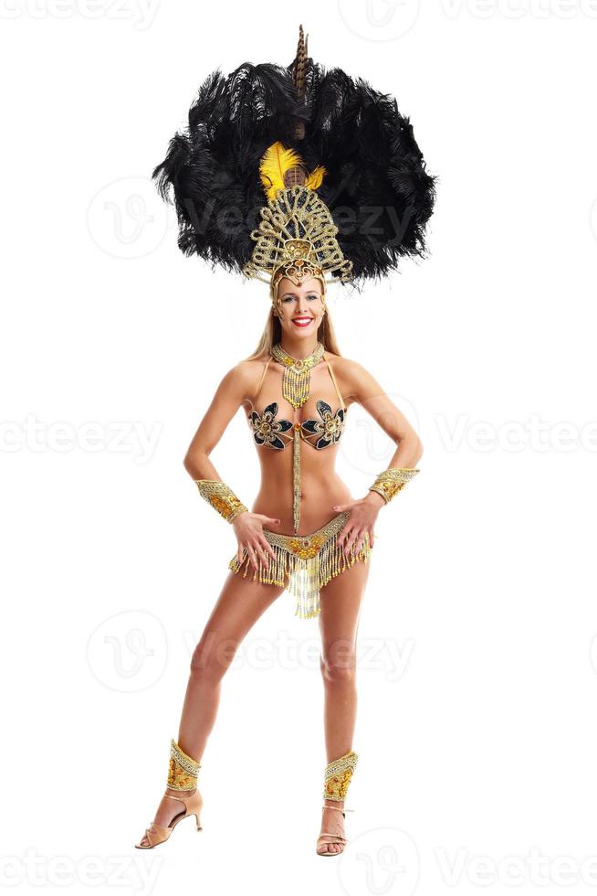 Brazilian woman posing in samba costume over white background photo