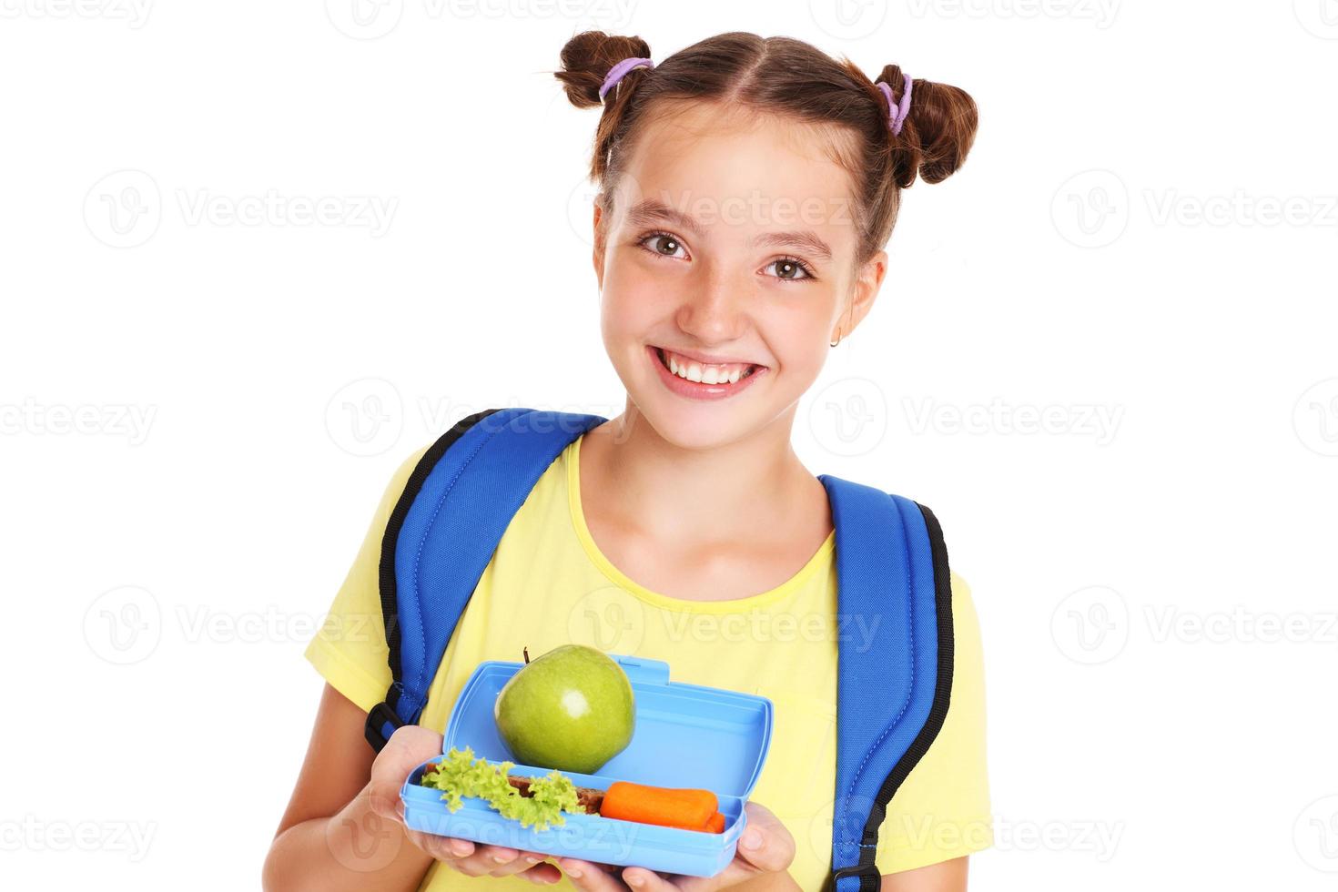 Happy girl with healthy lunchbox photo